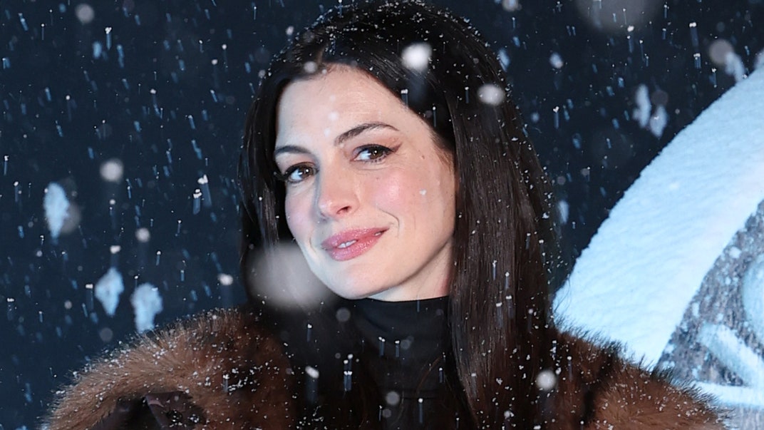 Anne Hathaway Isn't Trading Dramatic Winter Coats for Spring Jacket Trends Just Yet