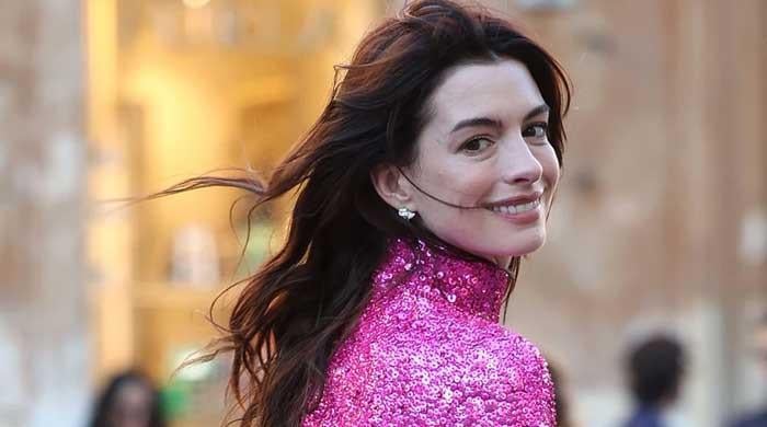 Anne Hathaway brings out her inner 'Barbie' in rare outing