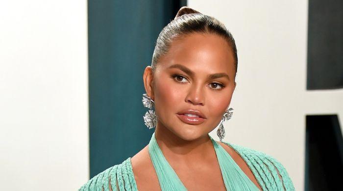 Chrissy Teigen's closet chaos ends in a brutal injury