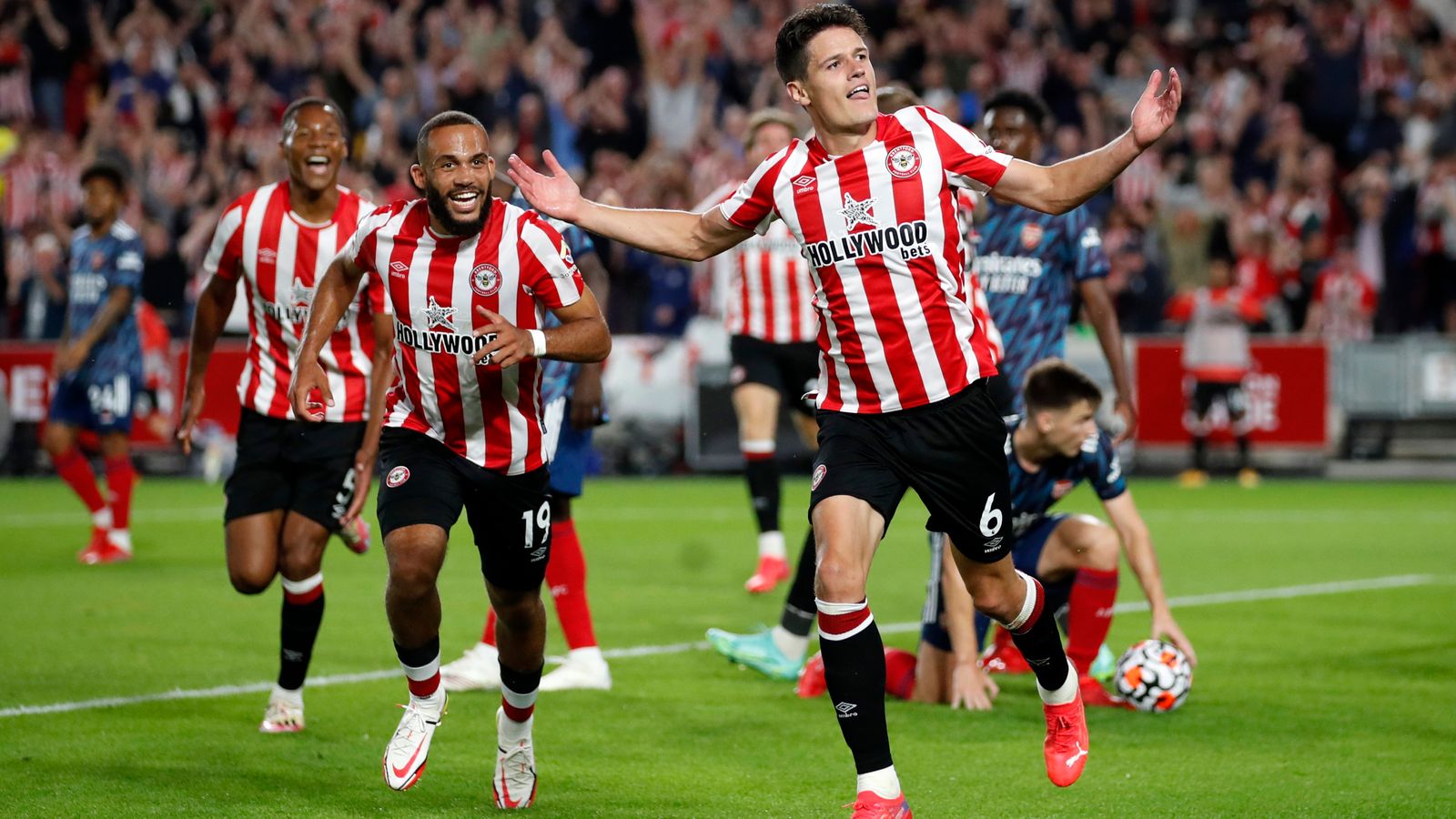 Soccer Football - Premier League - Brentford v Arsenal - Brentford Community Stadium, London, Britain - August 13, 2021 Brentford's Christian Norgaard celebrates scoring their second goal Action Images via Reuters/Peter Cziborra EDITORIAL USE ONLY.