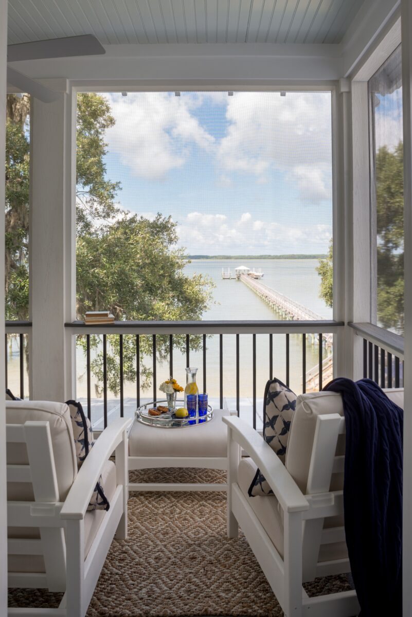 A porch looks out to the water