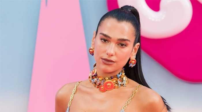 Dua Lipa comes close to exposing herself as she gets carried away at Melbourne performance