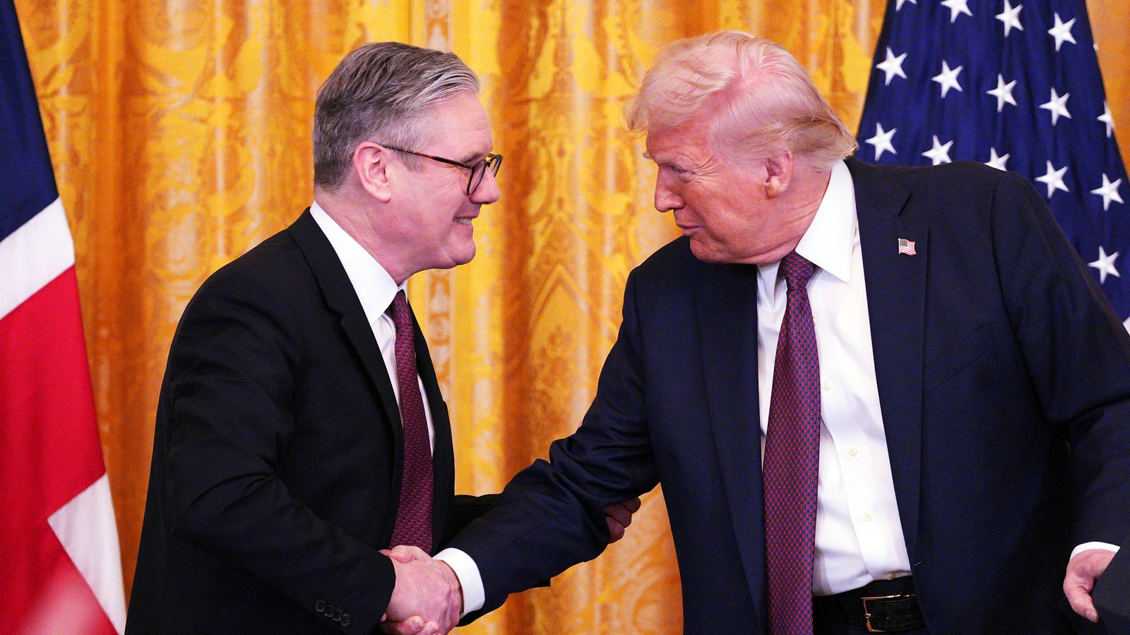 Sir Keir Starmer and Donald Trump shake hands at a news conference at the White House on 27 February. Pic: AP