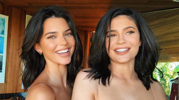 Kendall and Kylie Jenner leave rift behind in new BTS video