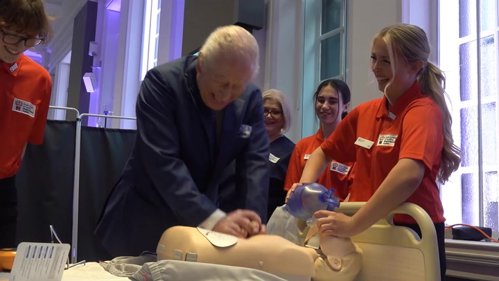 King Charles in hysterics as he practices CPR on dummy