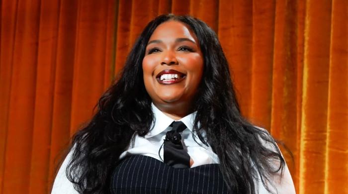 Lizzo proudly displays her slimmed-down physique on social media