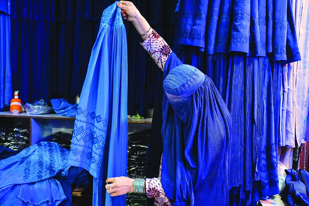 the blue burqa has become a symbol of taliban oppression photo afp