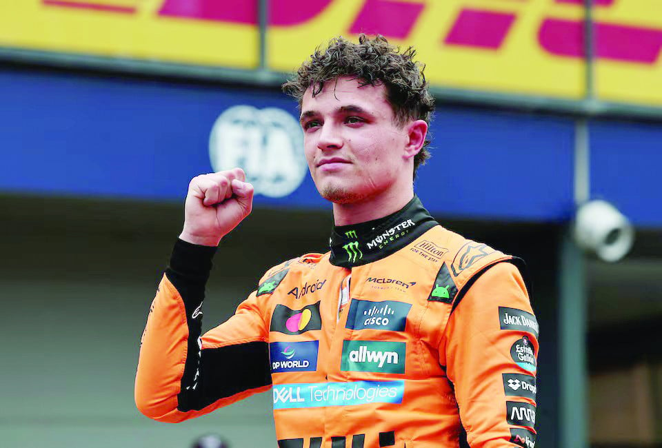 mclaren s lando norris celebrates after qualifying in pole position in the formula one australian grand prix qualifying at albert park grand prix circuit in melbourne on march 15 photo reuters