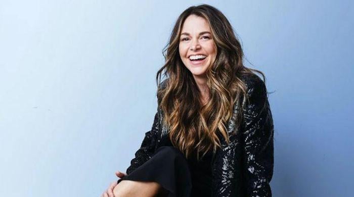 Sutton Foster bares skin on 50th birthday